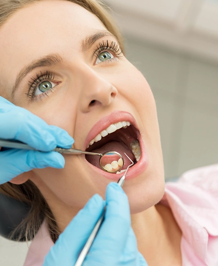 Patient during dental cleaning process